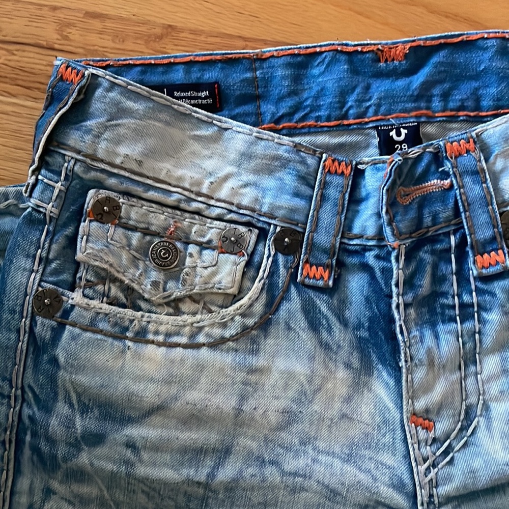 BRAND NEW. Worn once. Size W29. Orange stitching
